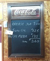 Wood framed Coca-Cola sign with blackboard.