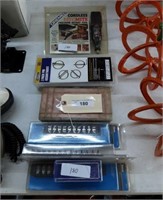 Fasteners, safety pins, small rotary tool.