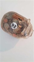 VINTAGE GLASS PIGGY BANK FULL OF ASSORTED COINS