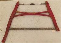 Red Painted Bow Saw