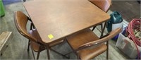 Samsonite Card table and 4 folding chairs