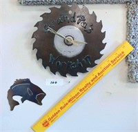 Clock - Made out of a Saw Blade that says