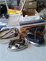 TWO VINTAGE STEAM IRONS