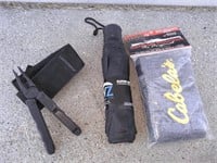 leatherman multi tool + gun sock and umbrella