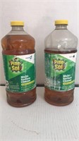 2 - 60 oz bottles PINE-SOL. One partially used