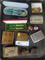 Pens, Tokens, Paper Weights,