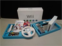 Nintendo Wii W/ 2 Games & Extra Controllers
