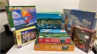(7) Puzzles ranging from 500-2,000 pieces, (1) is