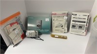 Pentax camera, Canon battery charger, camera