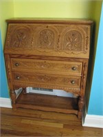 An Antique Carved Oak Slant Front Secretary