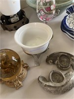 Decorative stem, snow globe, bowl, and fish