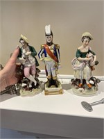 Three porcelain figurines, Michael Davis