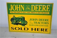 "John Deere Equipment" tin sign, age unknown