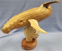 Fabulous carved whale on burl wood and sanded wood