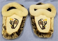 Pair of hand made seal skin slippers 10" soles