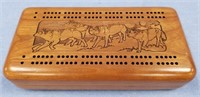 Wood cribbage board with ivory pegs             (P