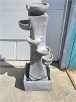 Fiberglass fountain with pump. 44 inches tall