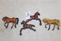 FOUR METAL HORSES