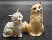 Two Royal Doulton seated cat figures