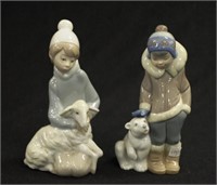 Two Lladro child with animal figurines