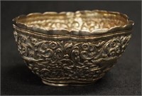 Oriental silver animal embossed bowl