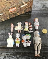 Box of small bisque dolls