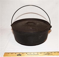 VINTAGE FOOTED #12 CAST IRON DUTCH OVEN