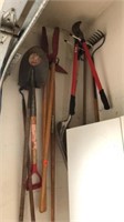 Hand Garden Tools hanging up (shovels, post hole