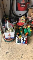 Boxes of cleaning supplies, weed b-gone, liquids,