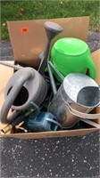 Large box full of Watering Cans