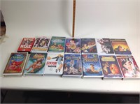 VHS tapes including Mulan, Tarzan, 101
