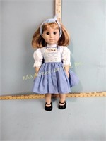 American Girl doll, marks on face