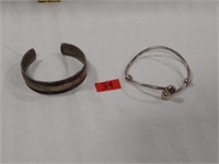 2 unmarked silver bracelets