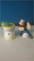 Popeye and a can of spinach salt and pepper