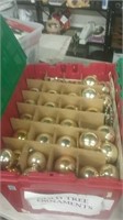 Tub of vintage gold tree ornaments includes the