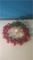 Holiday wreath of red Jingle Bells 7 in