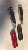 4 knifes. Red and black