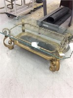 Metal coffee table with ruffled glass