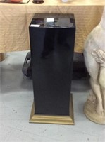 Black and gold pedestal