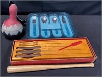 Box of miscellaneous knives, flatware, mini bat,