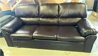 Leather sofa small tear on bottom