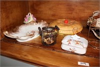 Shelf of ceramic/glassware