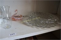 Shelf of glassware