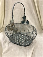 Metal basket with handle. Use is hanging planter
