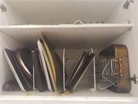 All the Cookie Sheets and Pans in this Cupboard