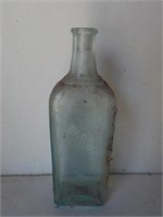 Early light green 7" bottle, SHED
