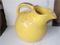 Yellow pottery pitcher 7" SHED