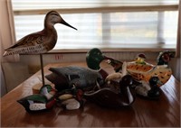 Assorted wooden and ceramic ducks