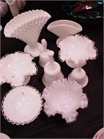 Nine pieces of milk glass, four with Silver Crest