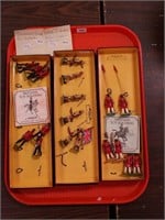 Three sets of Britains toy metal soldiers in